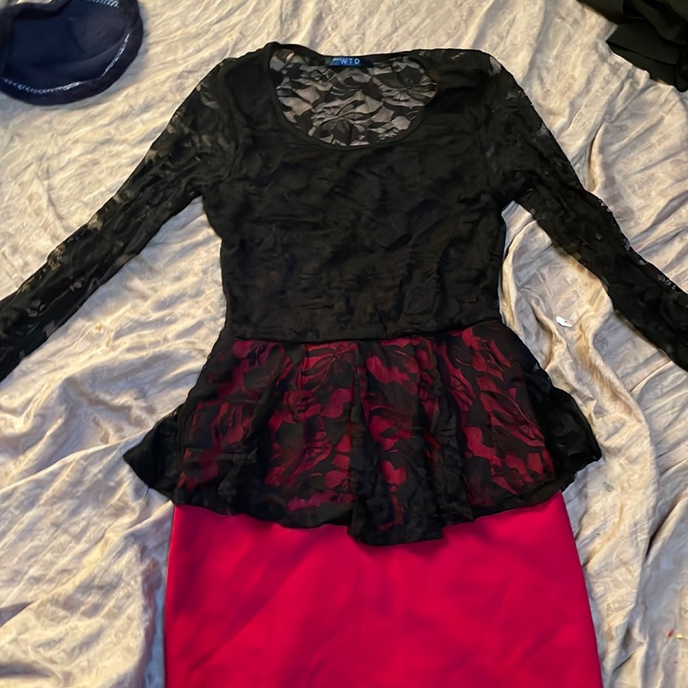 This dress is super cute! Black lace top and red bottom!!